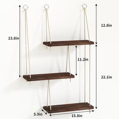 two wooden shelves are hanging from the wall