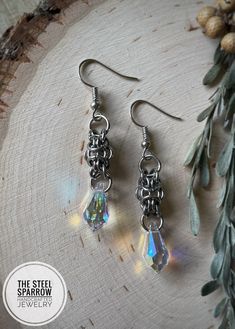 Swarovski Orc Weave Earrings | Etsy Silver Metal Teardrop Earrings Wire Wrapped, Silver Metal Wire Wrapped Teardrop Earrings, Silver Wire Wrapped Metal Teardrop Earrings, Handmade Silver Teardrop Crystal Earrings, Teardrop Metal Crystal Earrings For Gifts, Hypoallergenic Silver Crystal Earrings, Nickel Free Silver Teardrop Crystal Earrings, Nickel-free Silver Teardrop Crystal Earrings, Silver Wire Wrapped Teardrop Crystal Earrings