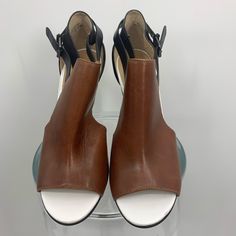 Neumann Marcus Nwt Heels, Brown, Black And White Leather. Heel Height Measures Approximately 4.5 Inches. New Condition. Item 4494-16/1768 Brown Closed Toe Heels Medium Width, Open Toe Heels With Contrasting Heel Counter For Office, Office Open Toe Heels With Contrasting Heel Counter, Office Open Toe Heels With Contrasting Heel, Brown Spring Heels For The Office, Brown Spring Heels For Office, Brown Spring Office Heels, Brown Almond Toe Sandals With Deep Heel Cup, Brown Stacked Heel Heels For Work