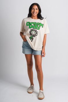 DayDreamer vintage Green Day band tee from Lush Fashion Lounge women's boutique in Oklahoma City. Lush boutique in OKC has a large variety of DayDreamer LA band tees and more! This trendy vintage graphic band t-shirt is a must have! Made from a 100% cotton fabric, feels like a luxury tour shirt with the perfect drape A blend of our Weekend Tee and OS Tee, this roomy fit t-shirt is like that perfect vintage find, featuring an open neckline and ladder stitch hems Officially licensed by Green Day Green Day Band, Dirty White, Ladder Stitch, Women's Boutique, Vintage Graphic, Tour Shirt, Green Day, Oklahoma City, Vintage Graphics