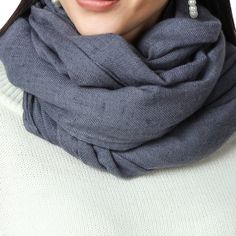 Stay cozy and stylish with this Handwoven Gray Cashmere Scarf. The versatile grey hue adds a touch of sophistication to any outfit, making it perfect for everyday wear. Made with soft and luxurious cashmere, this gray cashmere scarf will become a staple in your cold weather accessory collection. 100% Cashmere – World's finest Cashmere Cashmere Harvested from Changthangi goat who live in the Himalayan region of Ladakh Hand Spun & Hand Woven in Kashmir One Size: 28 Inch (Width) X 80 Inch (Length) Luxury Gray Scarf For Winter, Luxury Gray Scarves For Winter, Luxury Gray Winter Scarves, Gray Cashmere, Cashmere Pashmina, Cashmere Fabric, Cashmere Wrap, Pashmina Scarf, Cold Weather Accessories