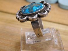 Sterling Silver Morenci Turquoise Ring Size 8.75. We can size it for an additional fee, please email me with what size you need and I'll get back to you with a price. The face of the ring measures 24 milllimeters in length and 24 millimeters across. The stone measures 16 millimeters in length and 11 millimeters across. This turquoise has a very interesting matrix which is complimented by the silver detailing around the stone. A beautiful everyday piece! Thank you for stopping by my shop, please Adjustable Untreated Blue Turquoise Ring, Adjustable Blue Turquoise Ring Collectible, Adjustable Nickel-free Vintage Turquoise Ring, Adjustable Nickel Free Vintage Turquoise Ring, Adjustable Vintage Turquoise Ring As Gift, Vintage Adjustable Nickel-free Turquoise Ring, Adjustable Vintage Turquoise Ring, Adjustable Vintage Turquoise Ring For Gift, Adjustable Vintage Nickel-free Turquoise Ring