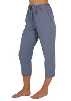 Designed for a comfortable fit and a conveniently chic look, these solid capri pants from Yogalicious are an ideal pick for casual wear. | Yogalicious Women's City Lite Expedition Travel Capri Pants, Medium Workwear Cropped Leg Capris With Elastic Waistband, Workwear Capris With Elastic Waistband And Cropped Leg, Casual Capris With Elastic Waistband, Capris With Elastic Waistband, Solid Athleisure Capris For Summer, Sporty Relaxed Fit Capris For Summer, Solid Color Athleisure Capris For Summer, Sporty Relaxed Fit Summer Capris, Casual Summer Capri Activewear