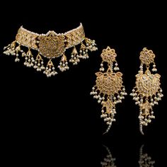 This timeless set is crafted with a distinct new age aesthetic! Stylish choker necklace handcrafted with gutka kundan and accentuated with pearl moti. The set includes a pair of matching earrings. Approximate earrings length is 3". For a complete look, accessorize this set with our Amaya Teekah. Gold-plated on high-quality brass as base metal. Made by order. Kindly allow 4-6 weeks for the delivery of this item. For custom or urgent requests, please contact support@alacouture.com. *Please Note: W New Age Aesthetic, Age Aesthetic, Handcrafted Accessories, Faux Stone, New Age, Base Metal, Matching Earrings, Faux Pearl, Choker