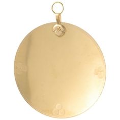 an antique gold pocket watch on a white background