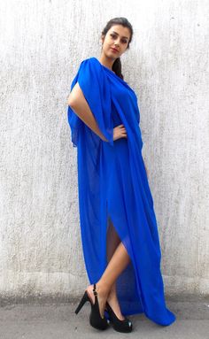 "Royal blue maxi plus size dress made of sheer chiffon veil. Strapless pencil underneath blue trikot dress.Blue crystal woven strap is sewn on left side and two scarfs on right shoulder. Elegant dress perfect for weddings. Extravagant summer kaftan. Two pieces included. Material: veil: 100% polyester underneath dress: 95% viscose, 5% full lycra Care instructions: Hand wash at 30 degrees The coral kaftan in the picture: https://www.etsy.com/listing/198540525/maxi-plus-size-kaftan-dress-maxi The m Blue Flowy Floor-length Chiffon Dress, Blue Floor-length Maxi Dress For Beach Cover-up, Blue Floor-length Maxi Dress For Beach, Elegant Blue Chiffon Dress For Beach, Blue Chiffon Long Maxi Dress, Bohemian Blue Chiffon Dress For Beach, Bohemian Blue Chiffon Beach Dress, Blue Bohemian Chiffon Beach Dress, Asymmetrical Chiffon Beach Dress