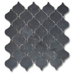 a black and white mosaic tile with wavy lines on it's sides, in the shape