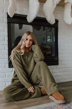 Look stylishly cozy from day to night in THE HENLEY SWEATER SET IN OLIVE. This waffle knit set is nursing friendly and features a button down henley top with an oversized fit and a hi-lo hem. The wide leg pants have an elastic waist for comfy stretch. Perfect for the chill life! Paired with THE WIMBLEDON LONG SLEEVE TOP IN WHITE Sold as a set. Top: Waffle texture throughout Oversized fit Hi-lo Button down henley Not see-through, no undershirt required Nursing friendly 42% acrylic, 30% polyester, Cozy Sets Outfit, Sweater Pants Set, Comfy House Outfit, At Home Outfits Cozy, Cozy Set Outfit, Chill Life, Knit Loungewear Set, Nursing Sweater, At Home Outfits