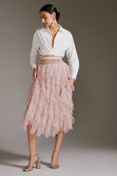 Ruffled Tulle Midi Skirt | Anthropologie Chic Midi-length Bottoms With Ruffles, Elegant Layered Skirt For Spring, Elegant Layered Hem Skirt For Spring, Elegant Skirt With Layered Hem For Spring, Elegant Spring Skirt With Layered Hem, Elegant Tiered Voluminous Skirt Bottoms, Spring Tiered Tulle Skirt Bottoms, Spring Tiered Tulle Bottoms, Spring Tiered Tulle Skirt