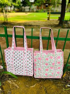 The Indian Hand Block Printed Cotton Quilted Women's Handbags from Rajasthan India. This Handbag is completely Indian Printed on good quality cotton. this cotton quilted shopping bag is totally unique and multi purpose. Use this for your grocery or as a travel bag. Perfect to suit all. Item :- Cotton Handbag Material: Quilted Cotton Fabric Color - as you like Pattern: Floral Block Print Style: Tote Bag, Handle Bag, Shoulder Bag Size in Inch:- Large Bag 16x15x5 inches  big bag 18x18x8 inches  Product Work: Printed & quilted Stitched Usage : Cosmetic, Make-up, Travel, Toiletries, Medicine, Accessories, Shopping and much more. Perfect for Beach Visits/ Quick Grocery runs/ Carrying Kids items/ Artist Paint book and Paints /Extra Bag Washable on Cold / Delicate wash Make a good Sustainable Gift Gift Shoulder Box Bag, Gift Box Shoulder Bag, Rectangular Cotton Shoulder Bag Gift, Rectangular Cotton Shoulder Bag Perfect As A Gift, Cotton Shoulder Bag As Gift, Cotton Shoulder Bag For Gift, Pink Cotton Shoulder Bag For Gift, Pink Cotton Rectangular Canvas Bag, Square Cotton Shoulder Bag As Gift