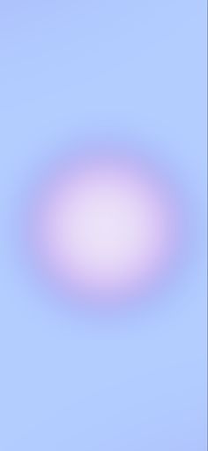 an abstract blurry background in blue, pink and green