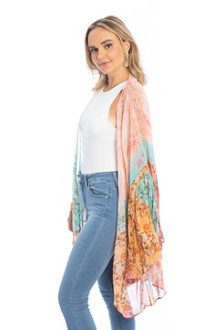 Hit the beach or kick it poolside in this flowy, semi-sheer kaftan that features an allover floral pattern, ruffled kimono-inspired sleeves and a sharkbite hem. Kimono-inspired sleeves 100% viscose Hand wash, line dry Imported Mystical Garden, Velvet Cape, Artisanal Design, Velvet Kimono, Cashmere Wrap, Fashion Marketing, Pashmina Scarf, Summer Staples, Ruffle Sleeves