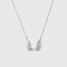 This exquisite necklace depicts the angel wings in great detail. Adorn it as a reminder that you're always protected by your guardian angel. A truly perfect gift for your loved one on all occasions. Material: 925 Sterling Silver Chain Length: 45 +5cm (17.7" + 1.96") Click ADD TO CART To Order Yours Now! The Checkout Process is Guaranteed to be 100% Safe and Secure with Visa, Mastercard, AMex, Discover, Apple Pay or PayPal. Silver Angel Wings Necklace As Gift, Elegant Winged Silver Necklace, Elegant Silver Winged Necklace, Silver Angel Wings Pendant Necklace, Winged Sterling Silver Necklace For Gift, Elegant Sterling Silver Winged Necklace, Elegant Silver Necklace With Angel Wings, Wing-shaped White Gold Necklace For Gift, Sterling Silver Wing-shaped Necklace