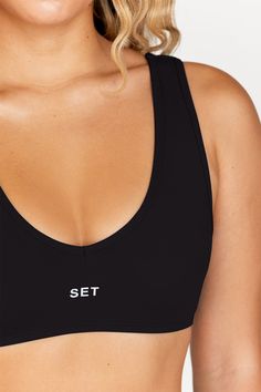 Carefully constructed to keep you feeling secure, the Dip Bra has 1.5” straps and a deep V neckline that’s deceivingly functional for how flattering it is — a.k.a. it's proof that sometimes less really is more. Made from our SPORTBODY™ fabric, it’s designed to move with your body, wick away moisture and keep you cool throughout your entire workout or work day. MODEL INFO: Bre is 5'8" and wears a size S This item is EXCHANGE ONLY and cannot be returned. Information regarding shipping, click here. Feeling Secure, Lounge Bra, The Dip, Monochrome Color, Sweat Top, V Neckline, Keep Your Cool, Active Wear Tops, Bike Shorts