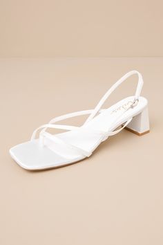 Subtly sultry and always chic, the Lulus Kerrie White Satin Strappy Low Heel Sandals will add a luxe to touch to any ensemble! Sleek woven satin shapes these unforgettable heels that have a square footbed, a thong-style upper, and a network of slender straps throughout. A matching, adjustable slingback strap secures with a shiny gold buckle, all atop cute block heel. 2" wrapped block heel. Cushioned insole. Felted rubber sole has nonskid markings. Man made materials. Imported. Lulus | Kerrie Whi White Strappy Heels, White Sandals Heels, Low Heel Sandals, Sandal Heels, Low Heel Shoes, Black Sandals Heels, Heel Sandal, White Flats, Fashion High Heels