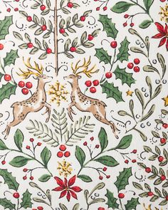 an ornately decorated wallpaper with holly leaves and deers on white, red and green