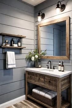 a bathroom with gray walls and wood accents