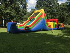 an inflatable slide is set up on the lawn