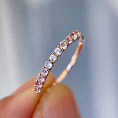 Moonstone Band Ring, Elegant Rose Gold Moonstone Promise Ring, Rose Gold Moonstone Halo Promise Ring, Rose Gold Moonstone Ring For Wedding, Rose Gold Round Moonstone Ring With Halo, Stackable Rose Gold Moonstone Ring, Stackable Round Moonstone Ring In Rose Gold, Rose Gold Halo Moonstone Ring For Wedding, Rose Gold Round Moonstone Ring Fine Jewelry