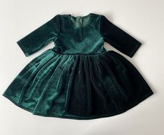 Dear customers❤ We produce very beautiful and cute dresses for your little princesess. This dress will be a great gift for your baby girl for Christmas. Fabric: velour. Our dresses are made by hand using only high-quality materials. You can choose another colour of fabric. If you want to order a matching headband, please, use the link:   https://www.etsy.com/listing/907630629/hair-accessories-baby-headband-newborn?click_key=87b04ff66f04882432928842c57dd2e1c33600d8%3A907630629&click_sum=26dcdfa3& Green Christmas Princess Dress For Dress-up, Green Christmas Dress For Dress-up, Green Christmas Dresses For Dress-up, Green Christmas Dress-up Dresses, Green Christmas Dress For Holiday Dress-up, Green Christmas Holiday Dress For Dress-up, Green Velvet Dress For Winter, Winter Green Velvet Dress, Green Christmas Holiday Dress