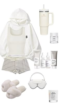 the contents of a woman's white outfit and accessories