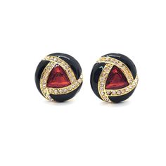 "**DISCLAIMER - this item is vintage and as such will likely not be in perfect condition.  Please review the description and photos carefully before purchase.** **DISCLAIMER - this item is vintage and as such will likely not be in perfect condition.  Please review the description and photos carefully before purchase.** Rad vintage red and black enameled clip on earrings.  The earrings are gold tone metal with an enamled geometric design in black and red with rhinestone accents. Made in the style of Ciner. Unknown maker. Not marked. c 1980s Condition is excellent.  Very little sign of use. There are no dents or dings. No chips or cracks. No loose or missing stones. No corrosion. Ready to wear. Each earrings measures 1\" in diameter." Vintage Black Enamel Earrings, Vintage Enamel Earrings For Evening, Vintage Style Enamel Earrings For Evening, Vintage Style Enamel Earrings For Evening Wear, Vintage Black Enamel Clip-on Earrings, Vintage Red Clip-on Earrings For Anniversary, Red Vintage Clip-on Earrings For Anniversary, Vintage Red Clip-on Earrings For Evening, Vintage Black Earrings For Anniversary