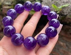 Material:Purple Amethyst Quartz beads size :  18mm quantity: one strand  6mm approx 29 pcs one strands 7mm approx25 pcs one strands 8mm approx 22 pcs one strands 9mm approx 21pcs one strands 10mm approx 19 pcs one strands 11mm approx 18pcs one strands 12mm approx 16 pcs one strands 13mm approx 16 pcs one strands 14mm approx 15 pcs one strands 15mm approx 14pcs one strands 16mm approx 14 pcs one strands 17mm approx 13pcs one strands 18mm approx 13pcs one strands 19mm approx 12pcs one strands 20mm Purple Beaded Bracelets With 8mm Beads, Purple Gemstone Crystal Bracelet, Purple Gemstone Beads Crystal Bracelet, Purple Crystal Bracelet With Gemstone Beads, Purple Bracelets With 8mm Round Beads, Purple Polished Beads Bracelet, Purple Amethyst Round Beads Crystal Bracelet, Purple Bracelets With Polished Beads, Purple Amethyst Round Beads Bracelet