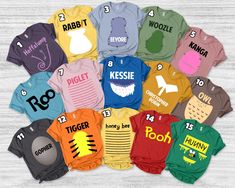 a group of t - shirts that are all different colors and sizes with numbers on them