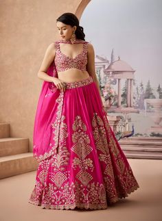 Step into regal elegance with this stunning lehenga featuring a classic moghul motif pattern. Adorned with marodi-style embroidery, it showcases intricate gotapatti work, dori, and sequins that create a mesmerizing visual appeal. Perfect for festive occasions and celebrations, this lehenga combines traditional craftsmanship with contemporary flair, ensuring you make a statement wherever you go. Gotapatti Work, Regal Elegance, Motif Pattern, Pink Lehenga, Indian Design, Photographic Lighting, Indian Outfits, Every Woman, Western Fashion