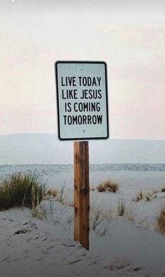 a sign that says live today like jesus is coming to tomorrow on the sand dunes