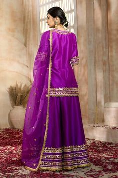 Purple short kurta with floral pattern gota embroidery. Comes with matching sharara and dupatta. - Aza Fashions Eid Art Silk Sharara With Dori Work, Silk Sharara With Gota Work For Reception, Purple Chanderi Sharara For Reception, Purple Palazzo Set With Dori Work For Wedding, Traditional Purple Sharara With Gota Work, Silk Sharara With Dori Work For Reception, Purple Palazzo Set With Pallu For Wedding, Purple Wedding Palazzo Set With Pallu, Purple Art Silk Sharara With Dori Work