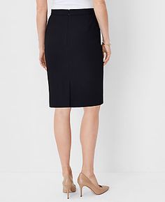 Elevate your wardrobe with the Ann Taylor Seamed Pencil Skirt in Bi-Stretch, tailored specifically for a curvy fit. This skirt is a testament to sophisticated styling and perfect tailoring, designed to enhance your silhouette.

- **Size**: 2 (Regular, Curvy Fit)
- **Color**: Classic Black
- **Material**: 66% Polyester, 28% Rayon, 6% Spandex
- **Length**: 21 1/2 inches long
- **Features**: Hidden back zipper with hook-and-eye closure, back vent, fully lined
- **Care**: Machine washable

Ideal for Fitted Pencil Skirt With Side Zipper For Office, Elegant Pencil Skirt With Side Zipper, Fitted Workwear Skirt With Side Zipper, Elegant Office Bottoms With Side Zipper, Workwear Stretch Skirt With Side Zipper, Workwear Skirt With Side Zipper And Stretch, Fitted Knee-length Bottoms With Side Zipper, Elegant Knee-length Bottoms With Side Zipper, Stretch Skirt With Side Zipper For Work