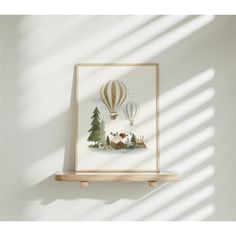 an air balloon is flying in the sky above some trees and other animals on a shelf