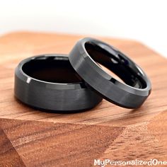 Matte Black Tungsten Wedding Band - Minimalist Black Engagement Ring - 8mm or 6mm Band - Comfort Fit - Personalized Gift - Promise Ring ♣ 8mm Band Width ♣ Comfort Fit ♣ 6-13 Size Available ♣ Brushed Center ♣ Beveled Edge ♣ Ring Box Included Elevate your wedding band game with our stunning tungsten wedding ring. Crafted from durable tungsten carbide, this ring is not only scratch-resistant but also hypoallergenic, making it an ideal choice for everyday wear. With its sleek and modern design, our Adjustable Black Couple Rings For Promise, Black Stainless Steel Couple Rings For Promise, Minimalist Black Couple Rings For Anniversary, Black Tungsten Wedding Band, Black Engagement Ring, Tungsten Wedding Band, Tungsten Wedding Rings, Black Tungsten, Tungsten Ring