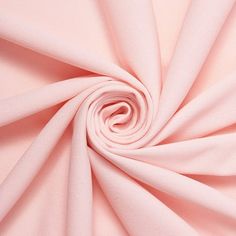 a close up view of a pink fabric