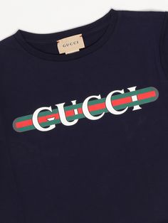 T-shirt T-shirt from GucciComposition: 100 Co Gucci Sporty Tops With Letter Print, Sporty Gucci Tops With Letter Print, Sporty Gucci Crew Neck Top, Gucci White Graphic T-shirt, Gucci White T-shirt With Letter Print, Gucci White Graphic Print T-shirt, White Gucci T-shirt With Logo Print, Gucci Crew Neck Top With Logo Print, Gucci Cotton Graphic Tee