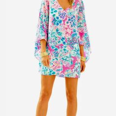 The Miri Silk Caftan Is A Cape Dress With Cascading Sleeves. Complete This Printed Party Look With Gold Jewlery And Wedges. V-Neck Cape Dress With Cascading Sleeves, 35" From Top Of Shoulder To Hem, Length: Above The Knee, Silk Cdc (100% Silk), Dry Clean Only, Imported. Casual Pink V-neck Cover-up, Pink Long Sleeve Beach Cover-up, Pink Beachwear Dress For Brunch, Pink Dresses For Brunch During Beach Season, Pink Dress For Brunch During Beach Season, Pink Printed Beach Dress, Pink V-neck Beach Cover-up Dress, Pink Long Sleeve Cover-up For Vacation, Pink Printed Beachwear Dress