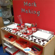 the desk is organized and ready to be used as an art supply area for kids