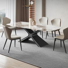 a dining room table with chairs around it