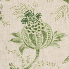 a green and white floral pattern on fabric