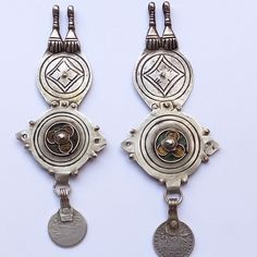 Old pendants made of silver and can be used to make your own necklaces. You can also make it a beautiful decoration on your clothes, looks like clothing brooch   * MOROCCO   * 1960  * total weight in grams: 23.3gram  * lenght: 11.6 cm  * width  : 4.4 cm  If there is any other question send me a message and I will be very happy to answer it as son as possible .  Visit my store: https://www.etsy.com/fr/shop/TazarzitElegance Silver Bohemian Brooch Jewelry, Silver Bohemian Jewelry Brooch, Silver Sterling Silver Earrings With Coin Pendant, Sterling Silver Earrings With Coin Pendant, Vintage Silver Medallion Earrings, Antique Silver Pendant Earrings, Vintage Silver Coin Earrings, Traditional Silver Round Pendant Earrings, Vintage Silver Earrings With Coin Pendant