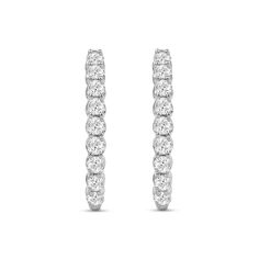 Achieve a most sophisticated look with these diamond oval-shaped hoop earrings. 10K white gold Each oval-shaped hoop features 1/20 ct. diamonds sparkling along the front edge 1 ct. t.w. of diamonds Hinged backs Oval Hoop Earrings In Diamond White With Brilliant Cut, Oval Diamond White Hoop Earrings Fine Jewelry, Diamond White Oval Hoop Earrings With Prong Setting, White Gold Diamond Hoop Earrings With Oval Shape, Oval Diamond Hoop Earrings In White Gold, White Gold Oval Diamond Hoop Earrings, Diamond White Oval Hoop Earrings For Formal Occasions, Oval Diamond Hoop Earrings With Diamond Accents, Oval Brilliant Cut Hoop Earrings For Formal Events