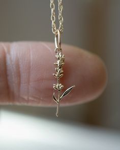 A lavender symbolizes purity, silence, devotion serenity, grace and calmness. Material: 14K Solid Gold Pendant measures 16mm in height, with a 4mm jump ring bail. Tiny Delicate Pendant Charm Necklace, Lavender Flower Jewelry With Flower Charm, Lavender Flower-shaped Jewelry With Flower Charm, Lavender Flower Charm Jewelry, Delicate Pressed Flowers Jewelry For Everyday, Delicate Pendant Charm Necklace With Lobster Clasp, Delicate Pendant Charm Necklaces With Lobster Clasp, Lavender Flower Jewelry With Birth Flower Detail, Lavender Flower-shaped Jewelry With Birth Flower