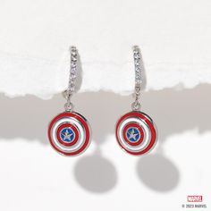 With our Marvel's Captain America Hoops, you can add some Super Hero style to your everyday look. The hoops feature Captain America's iconic shield, with vibrant red, white, and blue enamel detailing that's sure to make a statement. The glimmering stones that line the hoops add an extra level of chicness, making these earrings a true standout. Panther Earrings, Avengers Icon, Marvel Jewelry, Shop Disney, Wakanda Forever, Rose Gold And Silver, Marvel Captain America, Necklace Chain Lengths, Marvel X