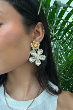 There’s nothing that says spring more than sparkles, florals and pearls. The Iris Rhinestone Flower earrings feature blossoming rhinestone flowers with pearl Irises. These earrings are the perfect compliment to any spring ensemble. **ALL ACCESSORIES ARE FINAL SALE** White Crystal Flower Earrings For Party, Party Pearl Drop Flower Earrings, Sparkling Flower Earrings For Party, Pearl Flower-shaped Earrings For Party, Elegant Flower-shaped Earrings With Rhinestones, Elegant Flower Shaped Rhinestone Earrings, Elegant Flower-shaped Rhinestone Earrings, Glamorous Spring Wedding Jewelry, Pearl Flower Earrings With Flower Charm