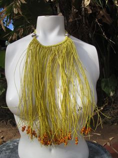 Bohemian Hippie Cotton Beaded Fringe Choker Multi Strand Bib Festival Necklace.The necklace is made of multi strands of yellow cotton, some end with beads, some without.The fall of the necklace is Approx. 18" long.Thanks for Looking!! Adjustable Yellow Wooden Beads Necklace, Adjustable Yellow Necklaces With Wooden Beads, Adjustable Yellow Necklace With Wooden Beads, Yellow Beaded Necklaces With Large Beads For Summer, Summer Yellow Beaded Necklaces With Large Beads, Summer Festival Multi-strand Beaded Necklaces, Wooden Beads For Summer Festival, Yellow Summer Festival Jewelry, Summer Festival Wooden Beads