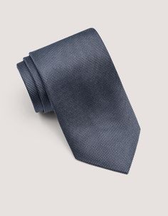 This grey self-pattern tie offers a classic look with a touch of magnetic charm. This versatile silk tie allows more interesting outfit combinations. The self-pattern on this tie adds a subtle layer of visual interest to your outfit, making it an attractive men's accessory. It can elevate a simple shirt and suit combination without being overly loud. This self tie is an adaptable option that can be dressed up or down depending on the occasion and your outfit pattern. 100% silk 100% polyester lin Elegant Edgy, Suit Combinations, Interesting Outfits, Tie Gifts, Men's Tie, Simple Shirts, Outfit Combinations, Tie Accessories, Printed Silk