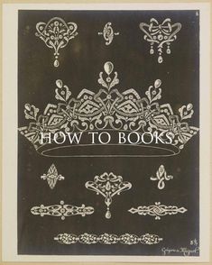 an old book with ornate designs on the cover and title how to books written in white ink