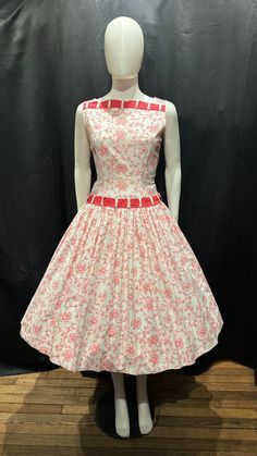 Beautiful crisp cotton day dress in lovely condition and with a super pretty print. The contrast cotton which it threaded at the neck and the drop waist is a great touch and really elevates the look of the dress. The shape is super elegant and it has a fab full skirt. It fastens with a centre back zip and has been washed and pressed. (petticoat not included) Bust 36" Waist 28" Waist to hem 27" Shoulder to waist 15.5" White A-line Vintage Cotton Dress, Retro Cotton Vintage Dress With Vintage Pattern, White Lined Cotton Vintage Dress, White Cotton Lined Vintage Dress, Cotton A-line Vintage Dress, White Cotton Vintage Dress With Lining, White Cotton 1950s Style Dress, Retro Cotton Dress With Vintage Pattern, Cotton Vintage Dress With Vintage Print For Daywear