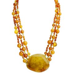 Piece by Designer Bozena The magnificent translucent golden butterscotch center stone has to be seen to be appreciated! Get earrings BSER052818-07 Stones: Baltic Amber, Peridot Length: Necklace is approx. 19" in length Width: Center stone approx. 2 1/4" long x 1 3/4" wide & approx 1" thick (depth) Material: .925 Silver Made in: Poland Stone Statement Necklace, Length Necklace, Amber Stone, Amber Jewelry, Affordable Jewelry, Baltic Amber, Precious Stones, Poland, 925 Silver